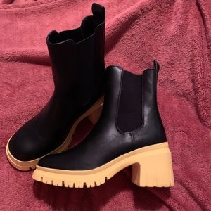 Black and yellow platform boots